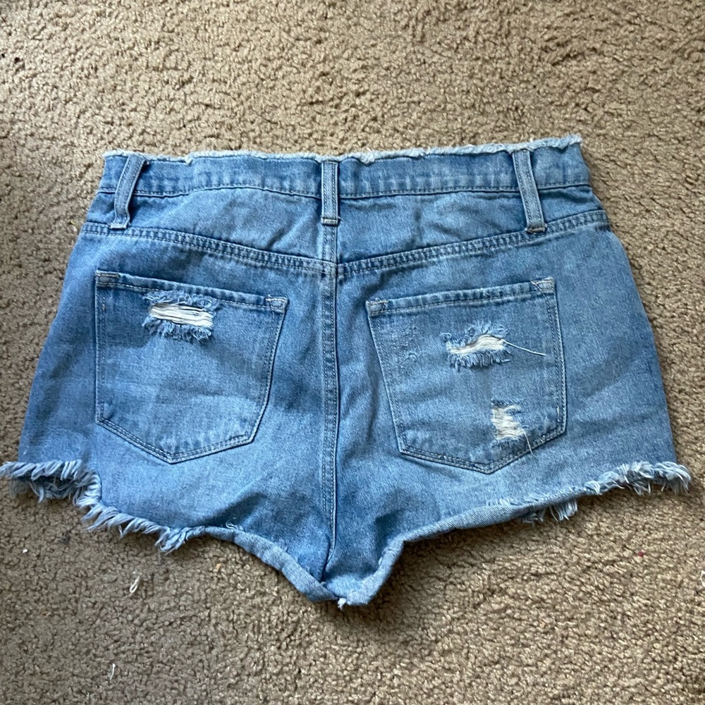 Distressed denim shorts